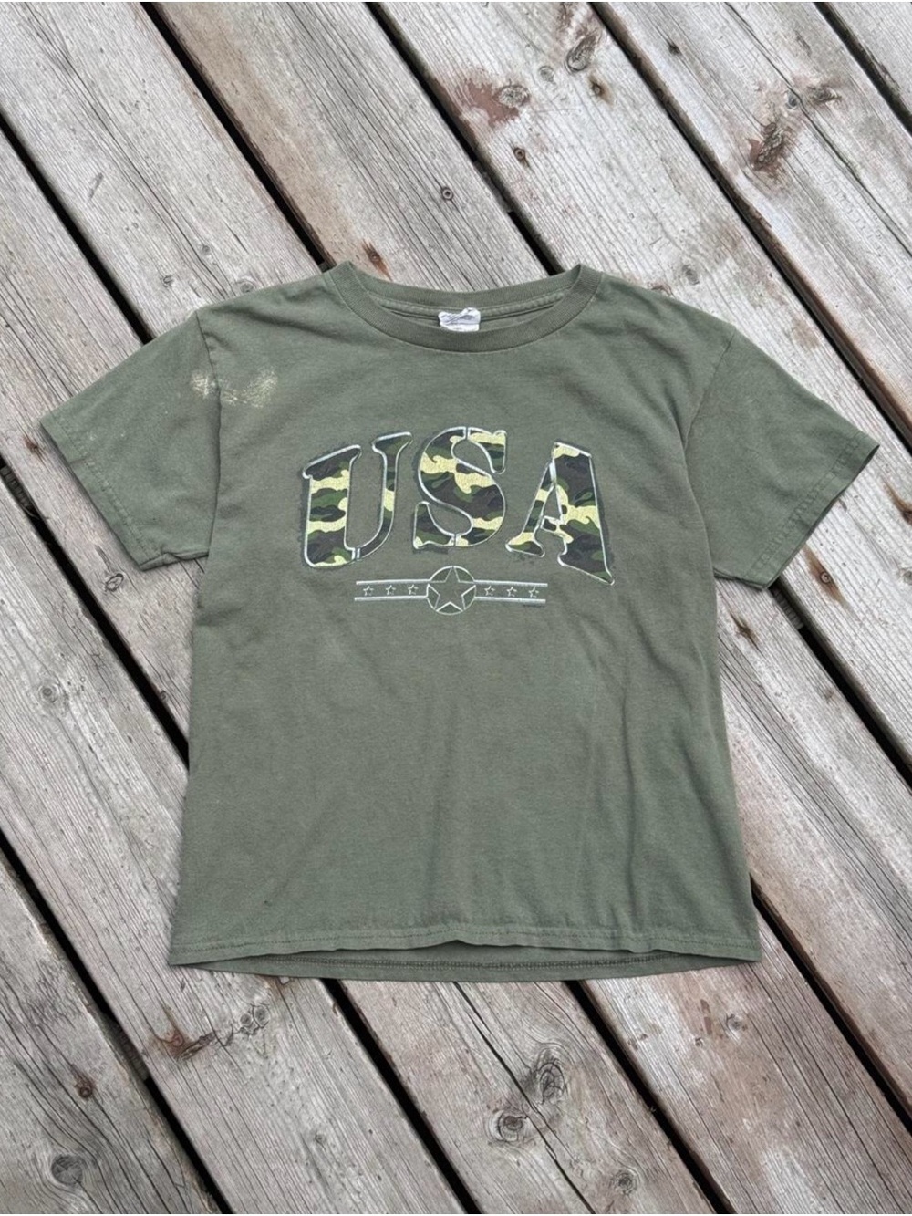 Green USA camo graphic baby tee with camouflage pattern
